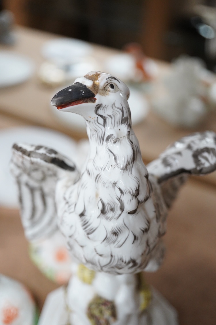 A rare Staffordshire porcelain model of an eagle or vulture, c.1830-50, and five Derby porcelain models, 1810–30; two recumbent sheep, a pug dog, a deer and a dove, 20cm high